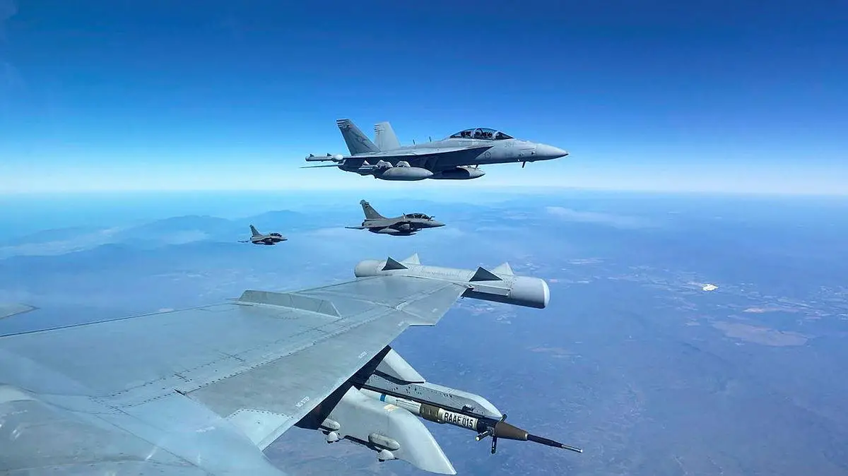 Royal Australian Air Force EA-18G Growler aircraft from No. 6 Squadron refuel with French Air and Space Force Dassault Rafale and A330 Multi-Role Tanker Transport aircraft over the Coral Sea on 17 August 2022