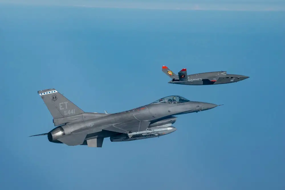A U.S. Marine Corps XQ-58A Valkyrie, highly autonomous, low-cost tactical unmanned air vehicle, conducts its first test flight with a U.S. Air Force F-16 Fighting Falcon aircraft assigned to 96th Test Wing at Eglin Air Force Base, Fla., Oct. 3, 2023. 