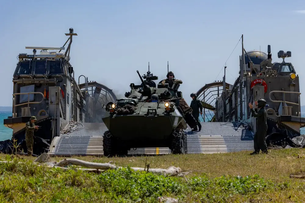 U.S. Marines with Battalion Landing Team 1/1, 31st Marine Expeditionary Unit, disembark a light armored vehicle from a Japan Maritime Self-Defense Force landing craft, air cushion during a bilateral landing for Iron Fist 24, at Kin Blue Beach Training Area, Okinawa, Japan, Mar. 12, 2024. 
