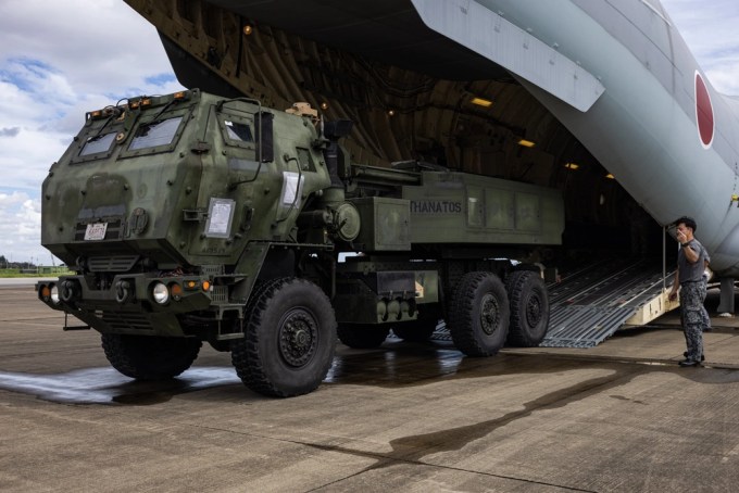 U.S. Marines and Japan Air Self-Defense Force members unload an M142 high mobility artillery rocket system out of a Kawasaki C-2 during a loading test on Japan Air Self-Defense Force Iruma Air Base, Sayama, Japan, Aug. 28, 2024.