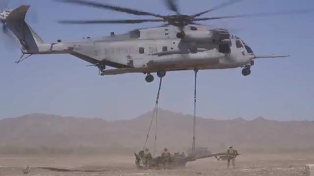 CH-53 Helicopter Air Lift Humvee and Howitzer