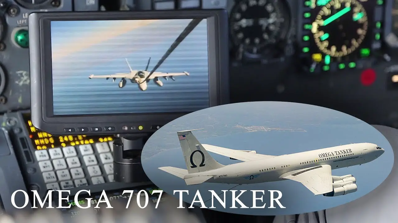 Civilian Air Refueling Tanker Omega 707 Refuels With Military F-18 Aircraft