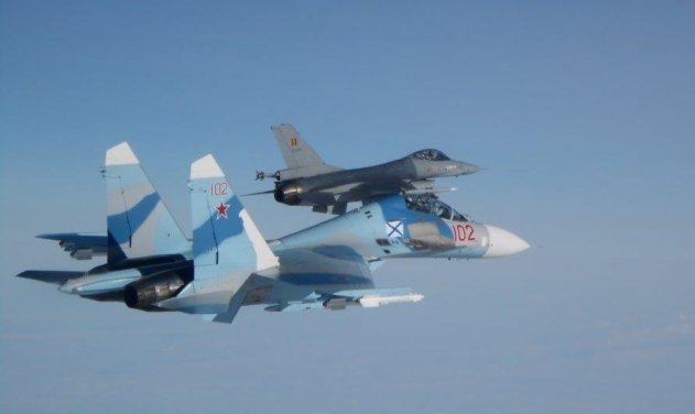 Belgian F-16 Fighting Falcon intercepted Russian Su-27 Flanker