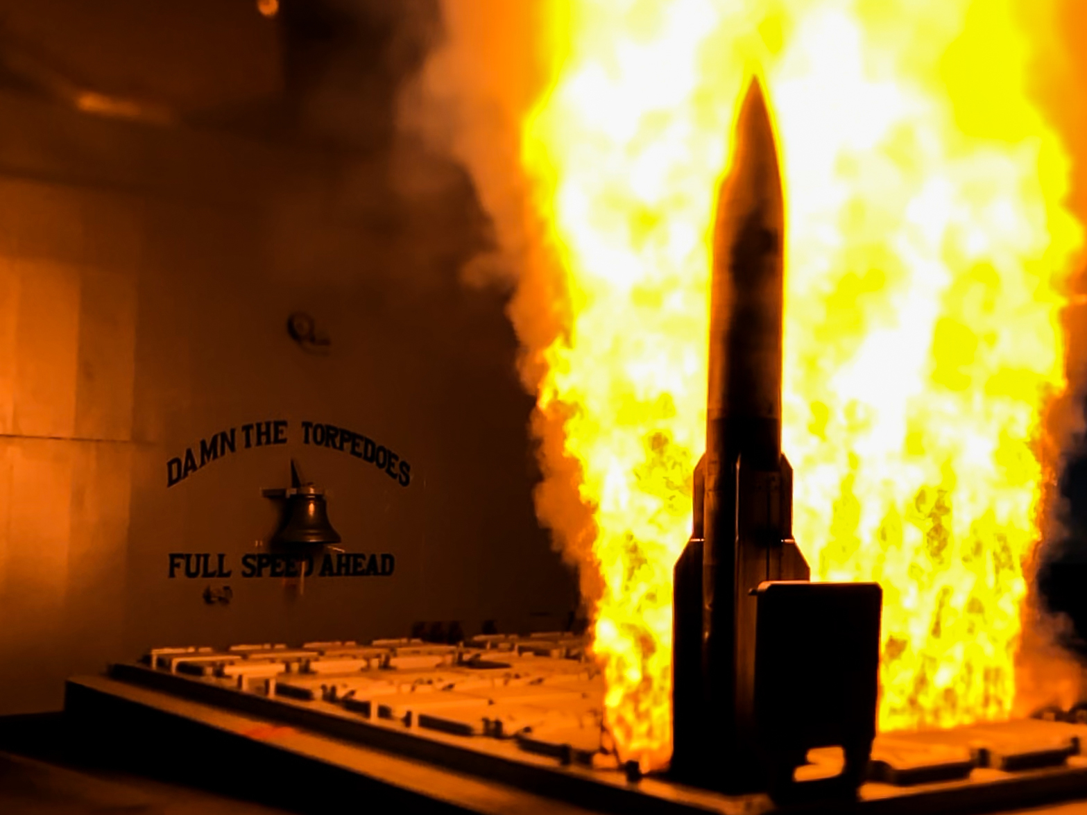 An SM-2 missile destroys an airborne training target during a successful first test of the updated Aegis Baseline 9 weapons system aboard the guided-missile cruiser USS Mobile Bay (CG 53)