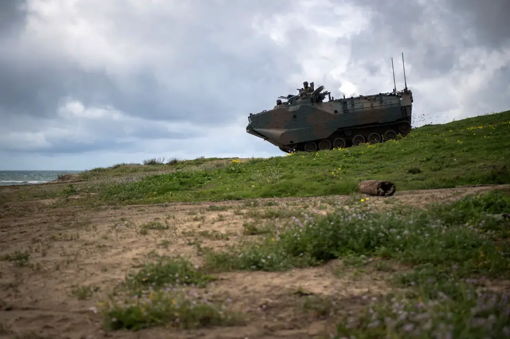 A Japan Ground Self-Defense Force amphibious assault vehicle drives downhill during Exercise Iron Fist 2019. (U.S. Navy photo by Mass Communication Specialist 2nd Class Devin M. Langer)