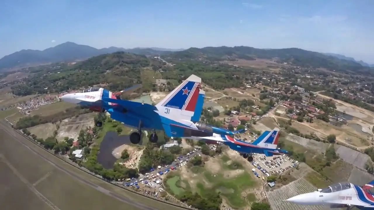 Russian Knights team perform aerobatic maneuvers at LIMA-2019