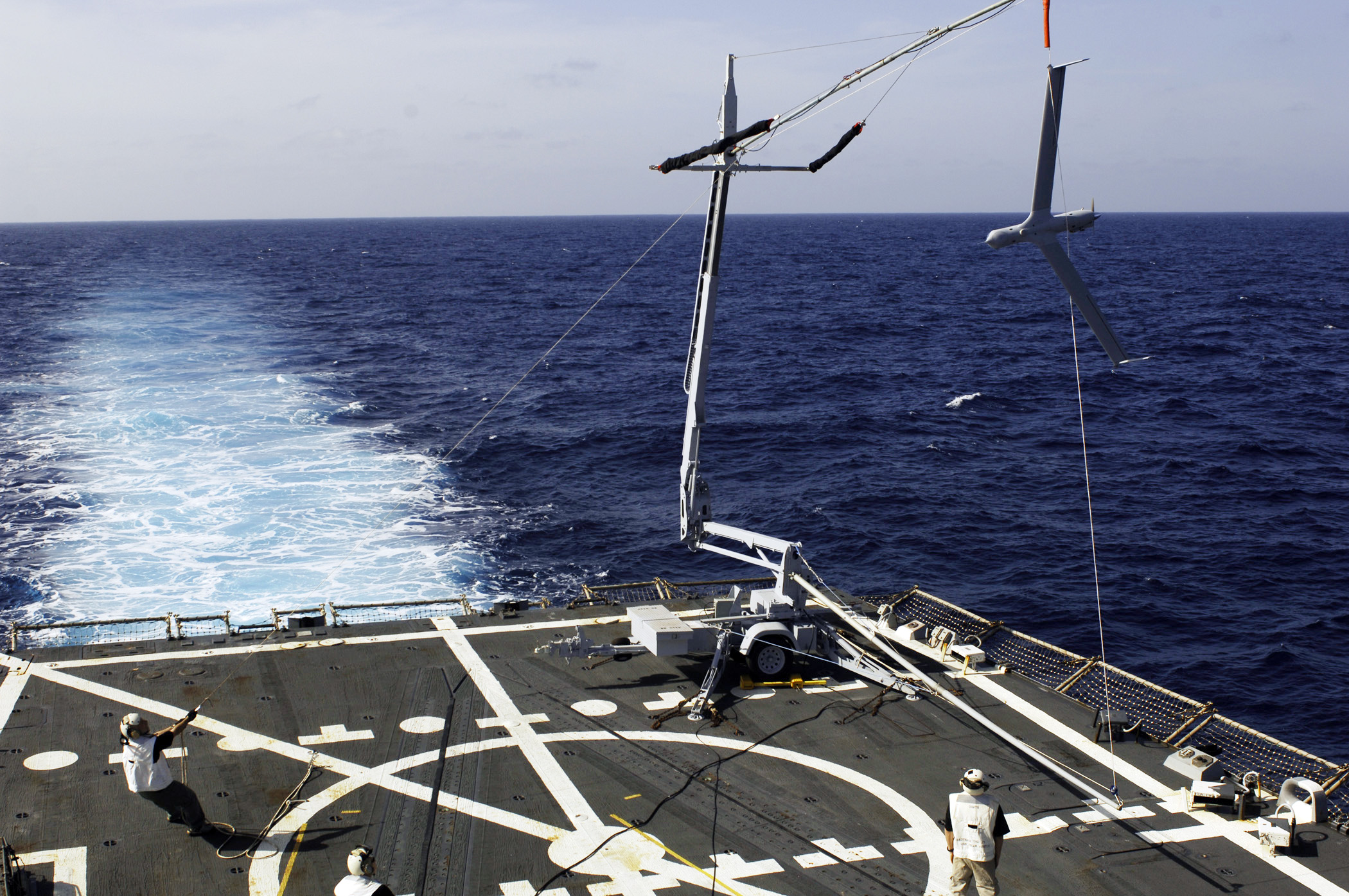 A Boeing Insitu ScanEagle UAVsis recovered at sea aboard the guided-missile destroyer USS Oscar Austin (DDG-79).