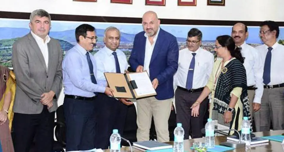HSL CMD Rear Admiral (retired) L.V. Sarat Babu and a delegation from Turkey exchanging documents for Fleet Support Ship project in Visakhapatnam on Tuesday.  