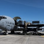 embers of the 6th Logistics Readiness Squadron and the 6th Operations Group load cargo onto a KC-135 Stratotanker aircraft at MacDill Air Force Base, Fla., Dec. 6, 2019. The cargo was loaded in preparation for a hisoric deployment of the entire 91st Air Refueling Squadron to Southwest Asia.