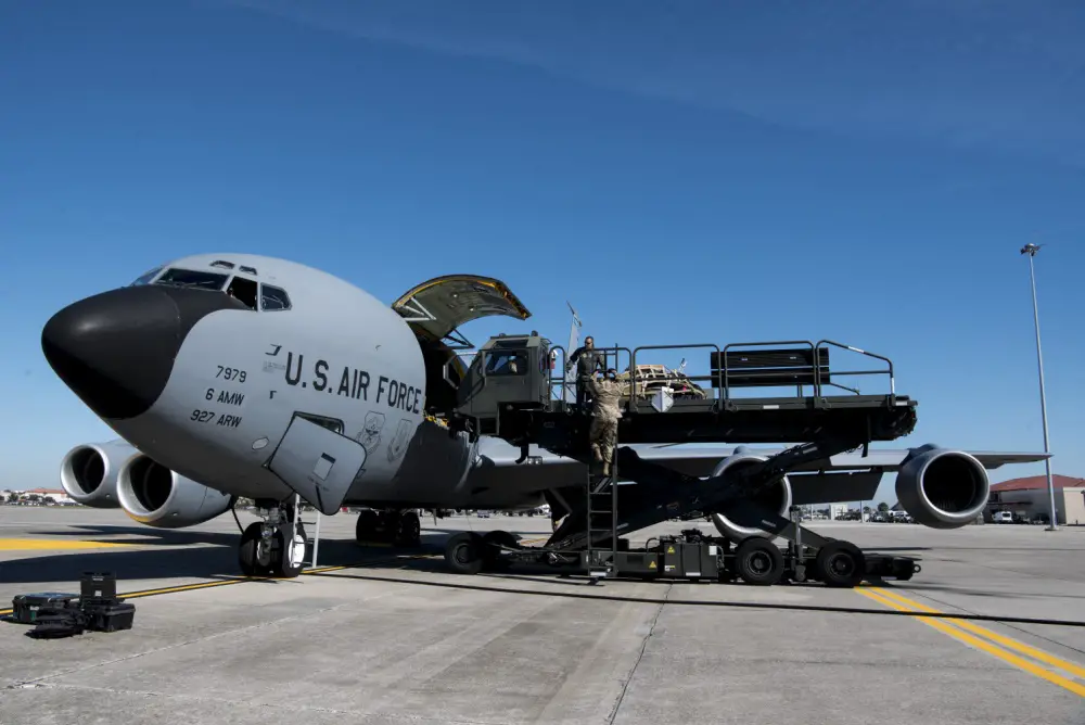 embers of the 6th Logistics Readiness Squadron and the 6th Operations Group load cargo onto a KC-135 Stratotanker aircraft at MacDill Air Force Base, Fla., Dec. 6, 2019. The cargo was loaded in preparation for a hisoric deployment of the entire 91st Air Refueling Squadron to Southwest Asia. 