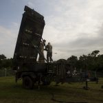 U.S. Marines with Marine Air Control Squadron 4, Marine Aircraft Group 36 set up the AN/TPS-80 G/ATOR radar system on Marine Corps Air Station Futenma, Okinawa, Japan, Feb. 26, 2019. MACS-4 Marines train to effectively assemble and operate the G/ATOR, the first of its kind to be used in the Indo-Pacific region. (U.S. Marine Corps photo by Lance Cpl. Leo Amaro)