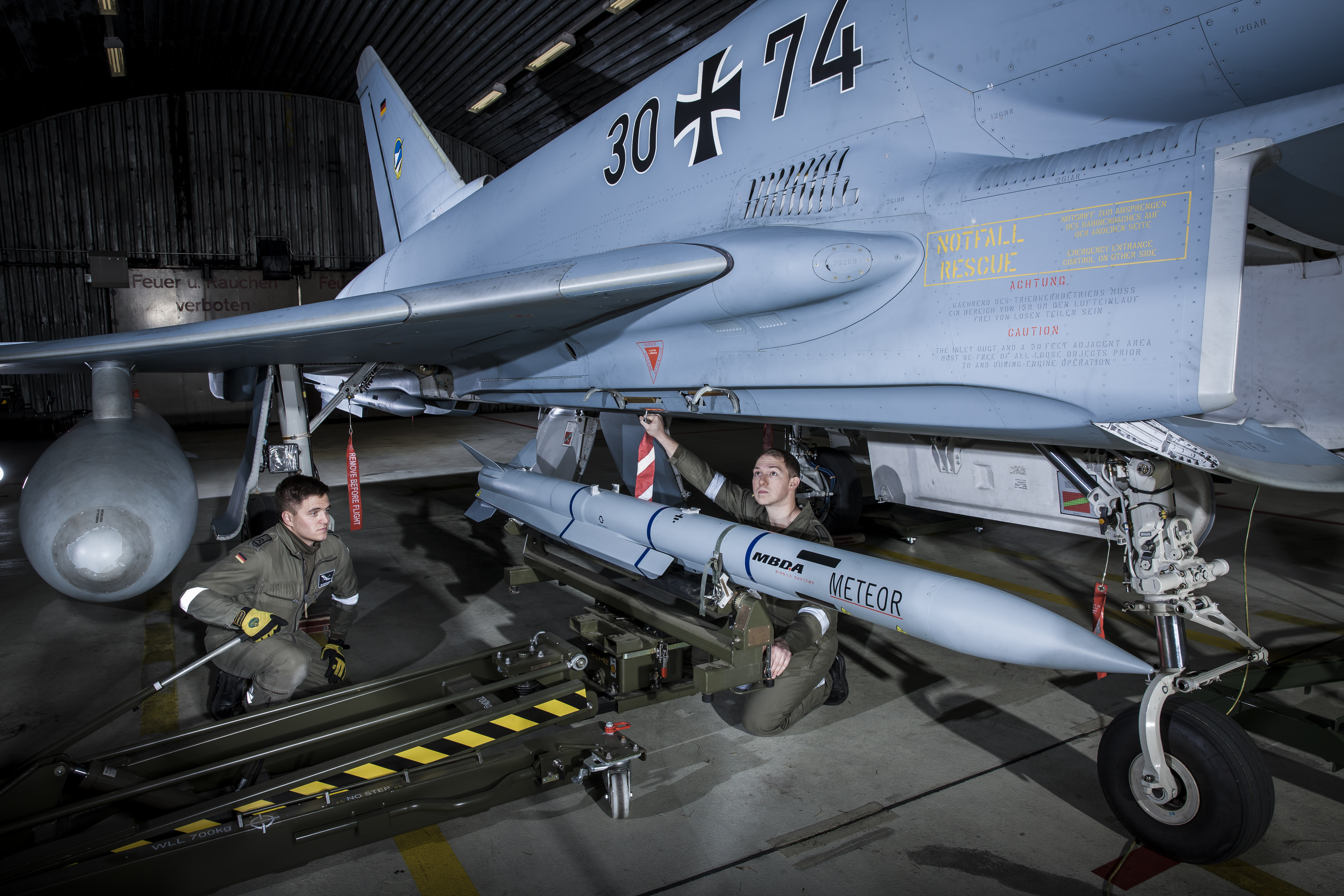 Luftwaffe ground personnel load a Meteor beyond visual-range air-to-air missile (BVRAAM) on a Eurofighter combat aircraft of the German Air Forceâ€™s 74th Fighter Squadron, based at Neuburg Donau. (MBDA photo)