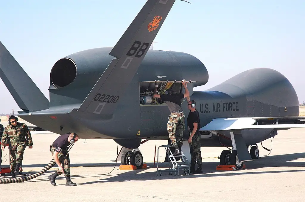 Avionics specialists with the 12th Aircraft Maintenance Unit prepare a Global Hawk for a runway taxi test at Beale Air Force Base, California. The Global Hawk is scheduled to begin flying at Beale in early November. The program is a total force effort with the Air Force Reserve's 13th Reconnaissance Squadron assisting active duty personnel.