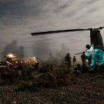 Australian Army soldiers from Special Operations Task Group prepare to board CH-47 Chinook helicopters during a night-time operation in Uruzgan province, Afghanistan, in June 2008.