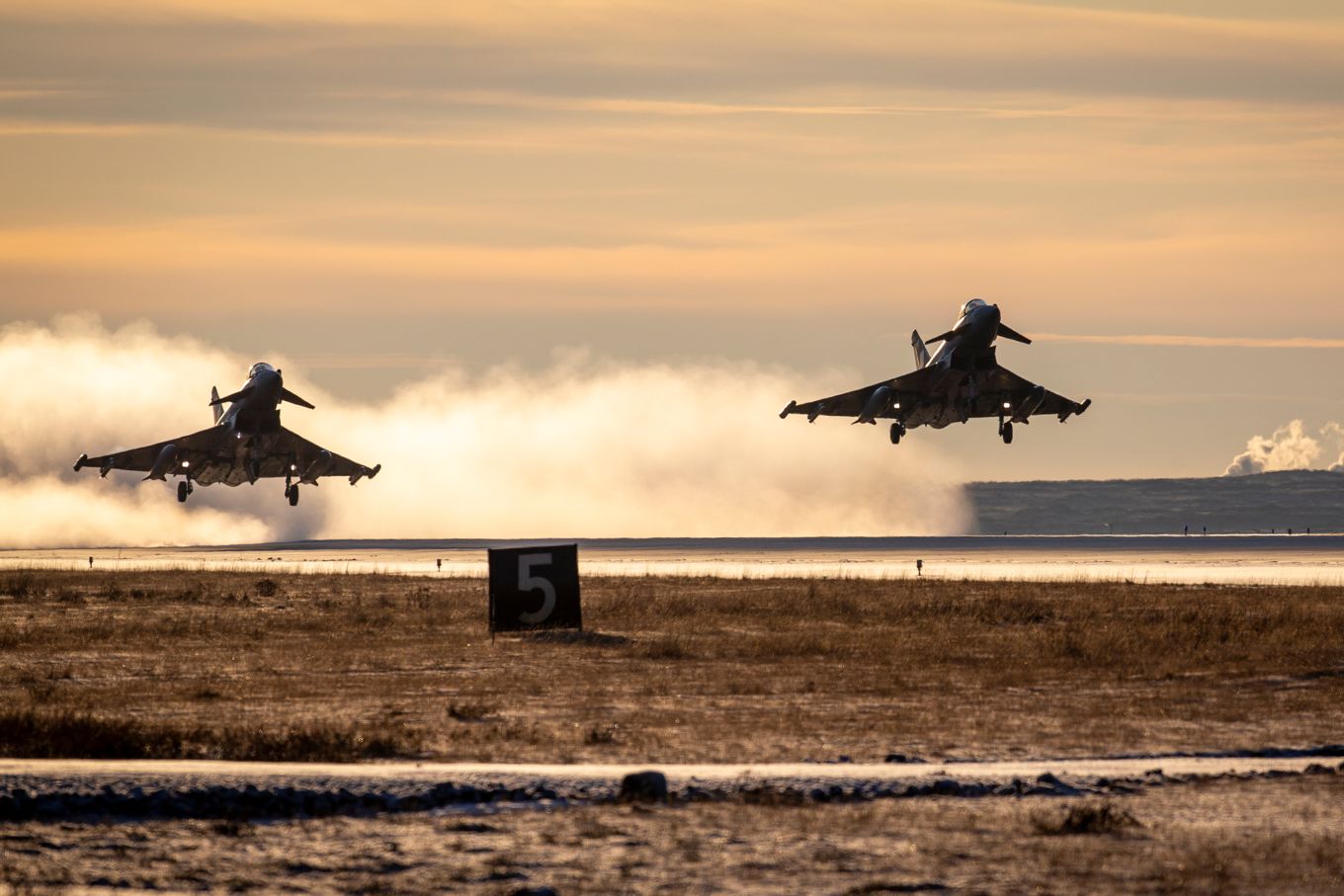 Two 1(F) Squadron Eurofighter Typhoon FGR4s take-off from Keflavik Air Base as part of the NATO Icelandic Air Policing mission