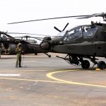U.S. soldiers prepare AH-64 Apache and UH-60 Black Hawk helicopters before a practice joint air assault exercise with Saudi soldiers near Tabuk, Saudi Arabia,