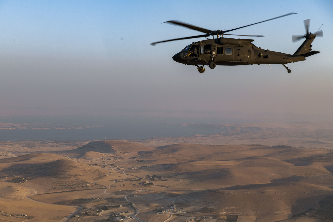A UH-60 Blackhawk, with Combined Joint Task Force - Operation Inherent Resolve, flies over the Syrian countryside, August 17, 2019. Blackhawk helicopters are essential air assets that fulfill a variety of roles that support the enduring defeat of Daesh. (U.S. Army photo by Spc. Alec Dionne)