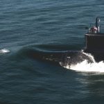 The Virginia-class submarine Delaware (SSN 791) sails the open waters after departing Huntington Ingalls Industriesâ€™ Newport News Shipbuilding division during sea trials in August. Photo by Ashley Cowan/HII.
