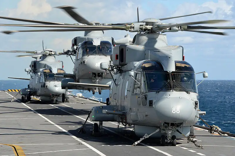 Royal Navy Merlin Mk2 helicopters on the flight deck of HMS Illustrious