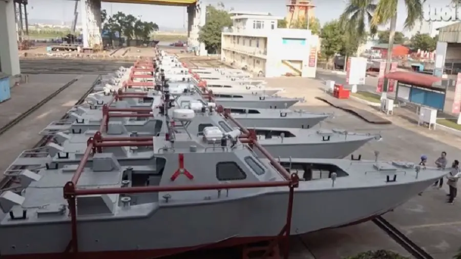 Eight Manta-type boats are seen lined up at the Hong Ha Shipbuilding Company facility in Haiphong