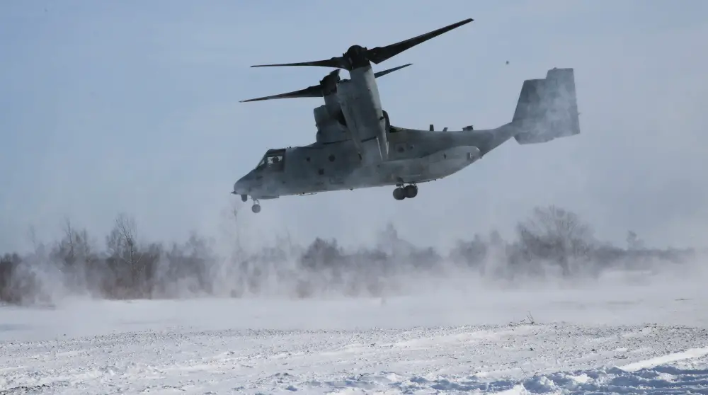 An MV-22B Osprey with Marine Medium Tiltrotor Squadron 262, 1st Marine Aircraft Wing, lands to offload U.S. Marines and members of Japan Ground Self-Defense Force as part of a heliborne insert during exercise Northern Viper