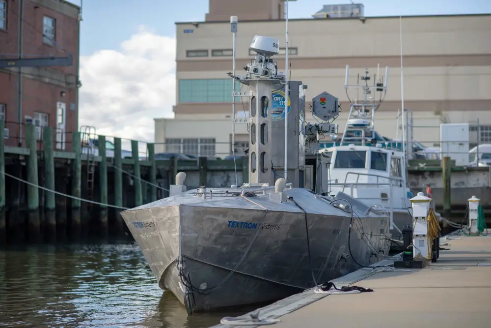 A developmental, early variant of the Common Unmanned Surface Vehicle (CUSV) autonomously conducts maneuvers on the Elizabeth River during its demonstration during Citadel Shield-Solid Curtain 2020 at Naval Station Norfolk. (U.S. Navy photo by Mass Communication Specialist 2nd Class Grant G. Grady/Released)