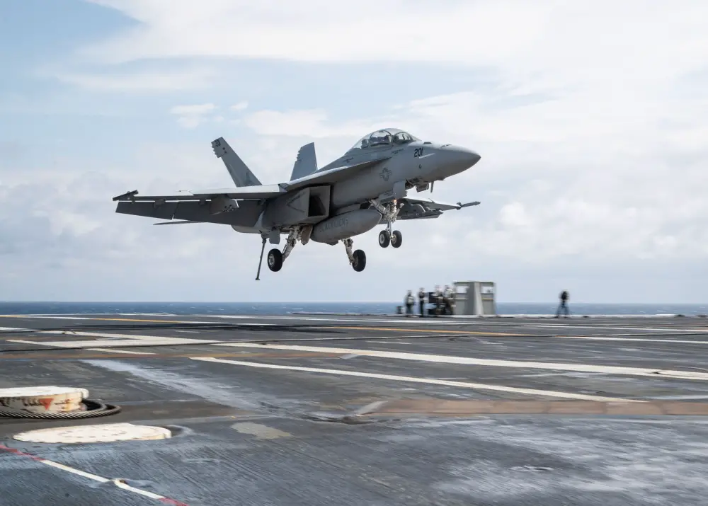 An F/A-18F Super Hornet, attached to "Black Lions" of Strike Fighter Squadron (VFA) 213, lands on USS Gerald R. Ford's (CVN 78) flight deck during flight operations. Ford is currently underway conducting its flight deck and combat air traffic control center certifications. (U.S. Navy photo by Mass Communication Specialist 3rd Class Zachary Melvin)