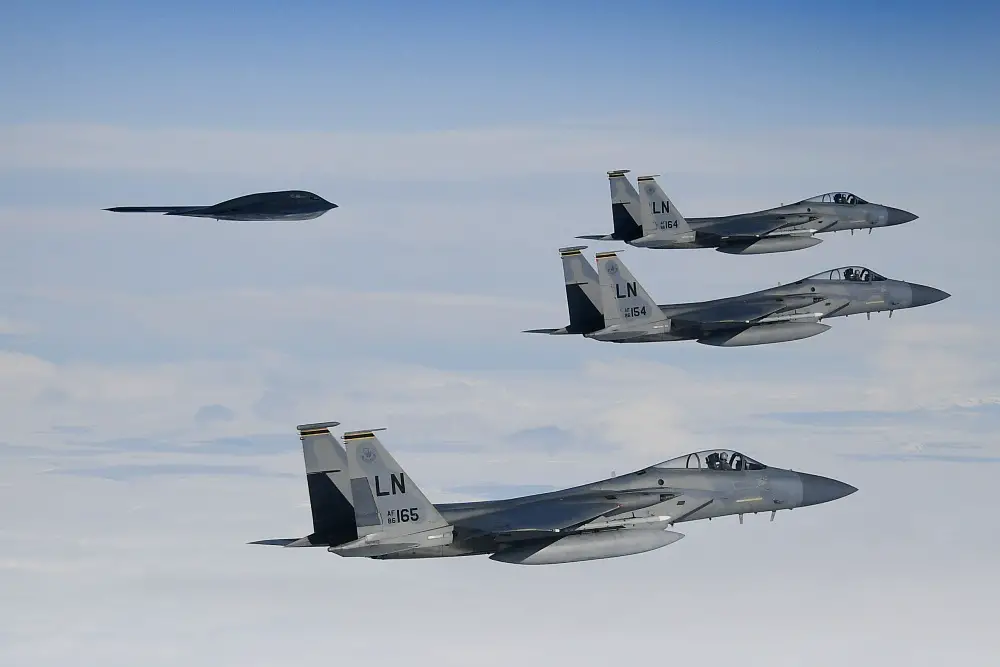 F-15C Eagles assigned to the 493rd Fighter Squadron conduct aerial operations with a B-2A Spirit in support of Bomber Task Force Europe 20-2 over the Keflavik, Iceland March 16, 2020. 