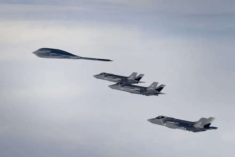 Royal Norwegian Air Force F-35A aircraft and a U.S. Air Force B-2A Spirit bomber conduct aerial operations in support of Bomber Task Force Europe 20-2 over Keflavik, Iceland March 16, 2020.