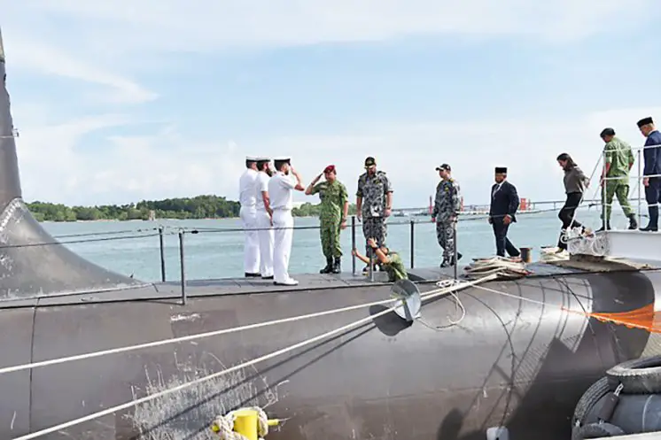 His Royal Highness Prince Haji Al-Muhtadee Billah Ibni His Majesty Sultan Haji Hassanal Bolkiah Mu'izzaddin Waddaulah, the Crown Prince of Brunei and General of the Royal Brunei Armed Forces is welcomed on board by members of the ship's company of HMAS Dechaineux during a port visit to Brunei.