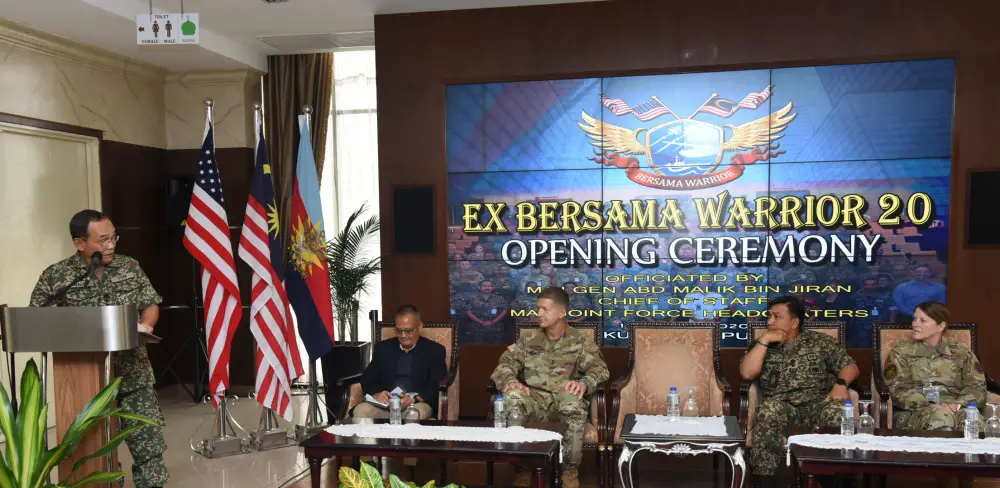 Malaysia Armed Forces Joint Force Headquarters Chief of Staff Maj. Gen. Abd Malik bin Jiran officiates the opening ceremony of Bersama Warrior on March 11, 2020 at the Malaysia Armed Forces Joint Force Headquarters in Kuala Lumpur. Also pictured, from left to right, is U.S. Army U.S. Indo-Pacific Command, Pacific Warfighting Center Director Mr. Paul Tamaribuchi, 25th Infantry Division Commander Major General James B. Jarrard, 12th Malaysian Infantry Brigade Commander Brig. Gen. Datuk Marzuki bin HJ Mokhtar, and Special Assistant to the Director of the Air National Guard Brig. Gen. Jill A. Lannan. 