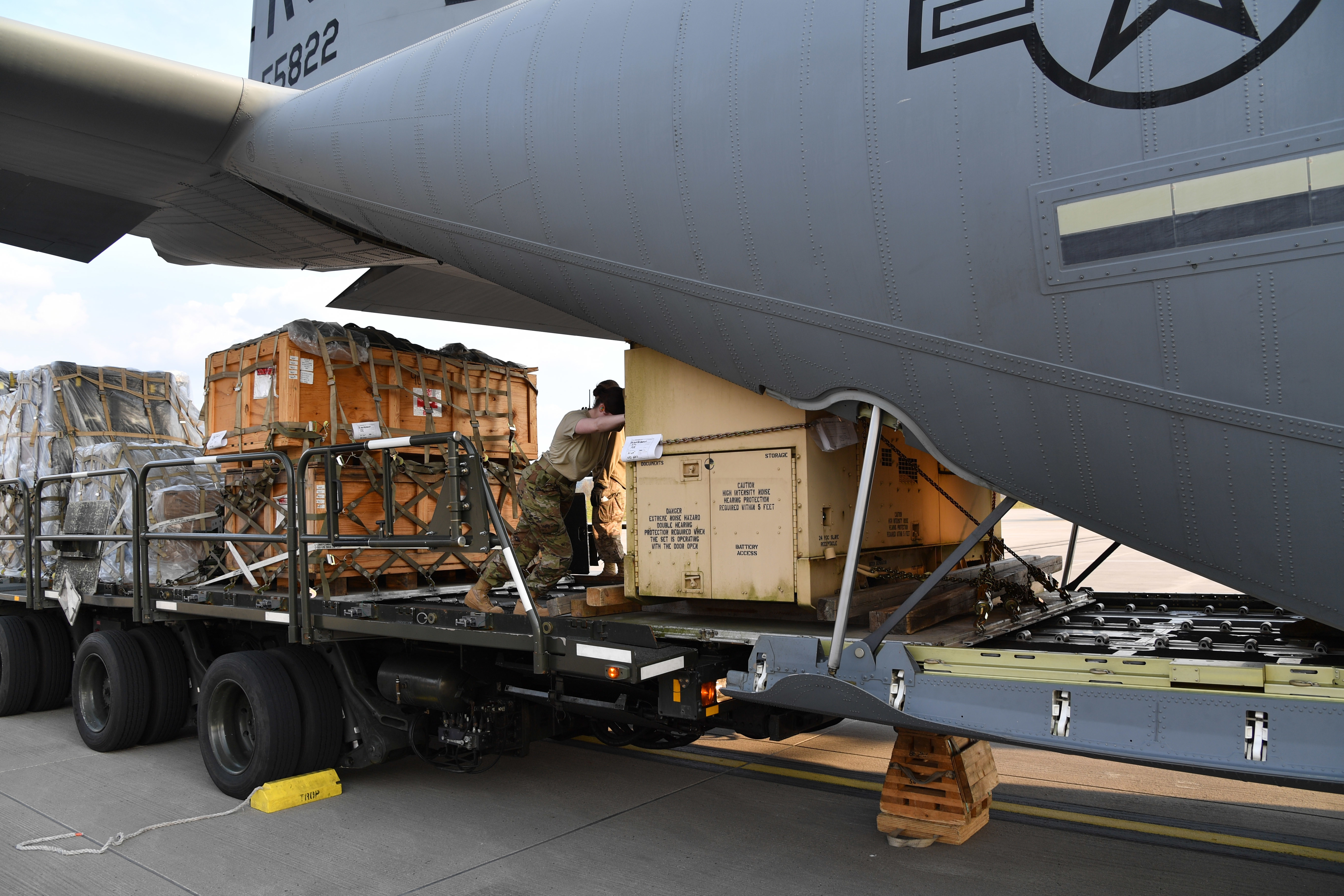 Airmen assigned to the 721st Aerial Port Squadron load pallets of medical supplies onto a C-130J Super Hercules heading to Aviano Air Base, Italy, at Ramstein Air Base, Germany, March 20, 2020. 