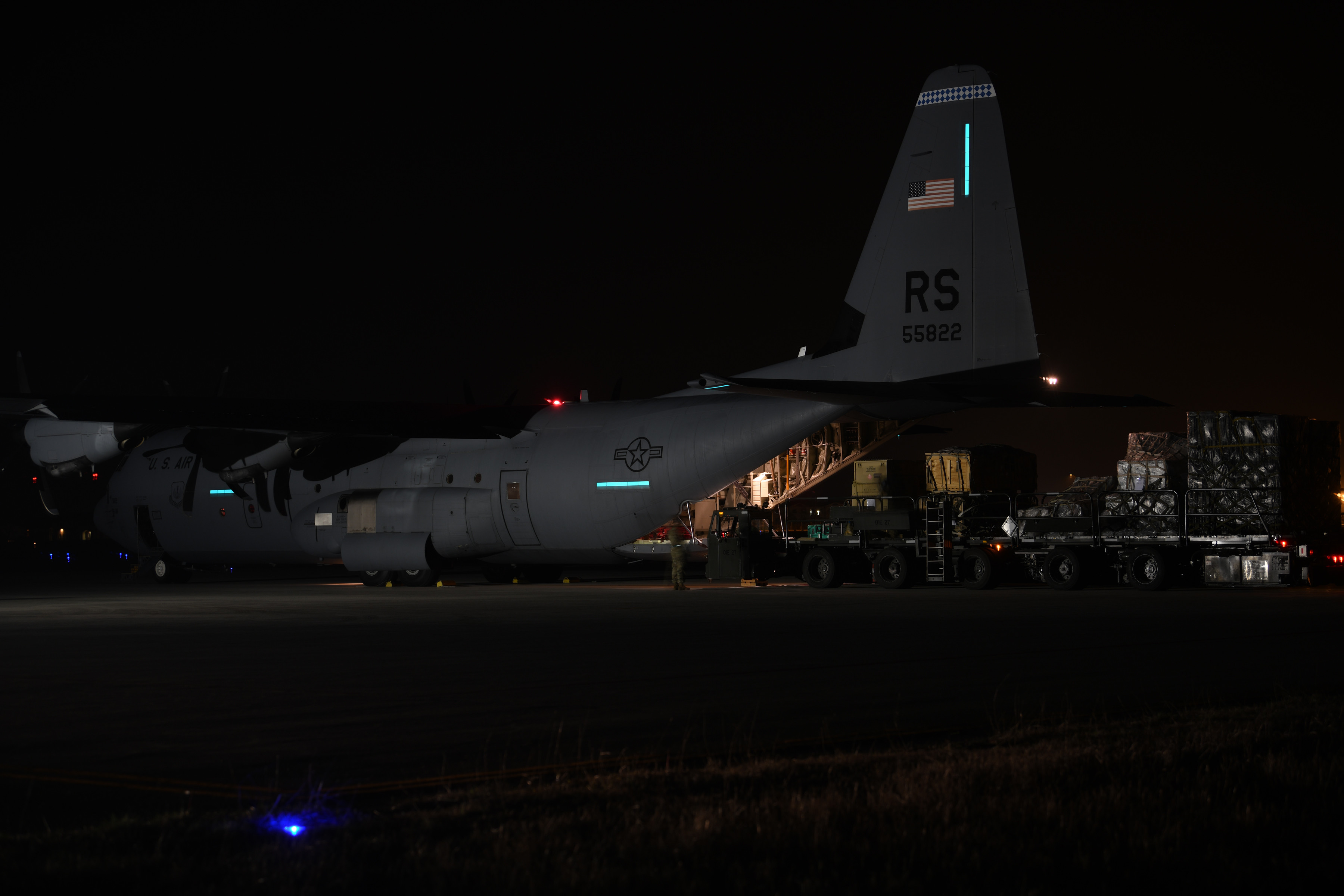 A C-130J Super Hercules stationed out of Ramstein Air Base, Germany delivers pallets of medical equipment to Aviano Air Base, Italy, March 20, 2020.
