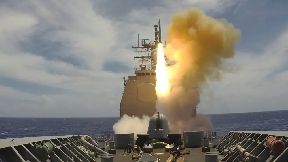 The Arleigh Burke-class guided-missile destroyer USS Barry (DDG 52) launches a missile during a live-fire exercise. Barry is underway conducting operations in support of security and stability in the Indo-Pacific while assigned to Destroyer Squadron 15 the Navy's largest forward-deployed DESRON and the U.S. 7th Fleet's largest principal force. (U.S. Navy photo by Mass Communication Specialist Seaman Askia Collins)