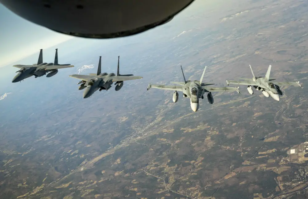 Aircrew and members of the Air National Guard and Royal Canadian Air Force practiced tactical-intercept skills in an air defense exercise designed to reinforce interoperability across the United States and Canadian border. (U.S. Air National Guard Photo courtesy of Capt. Kyle Tufts)