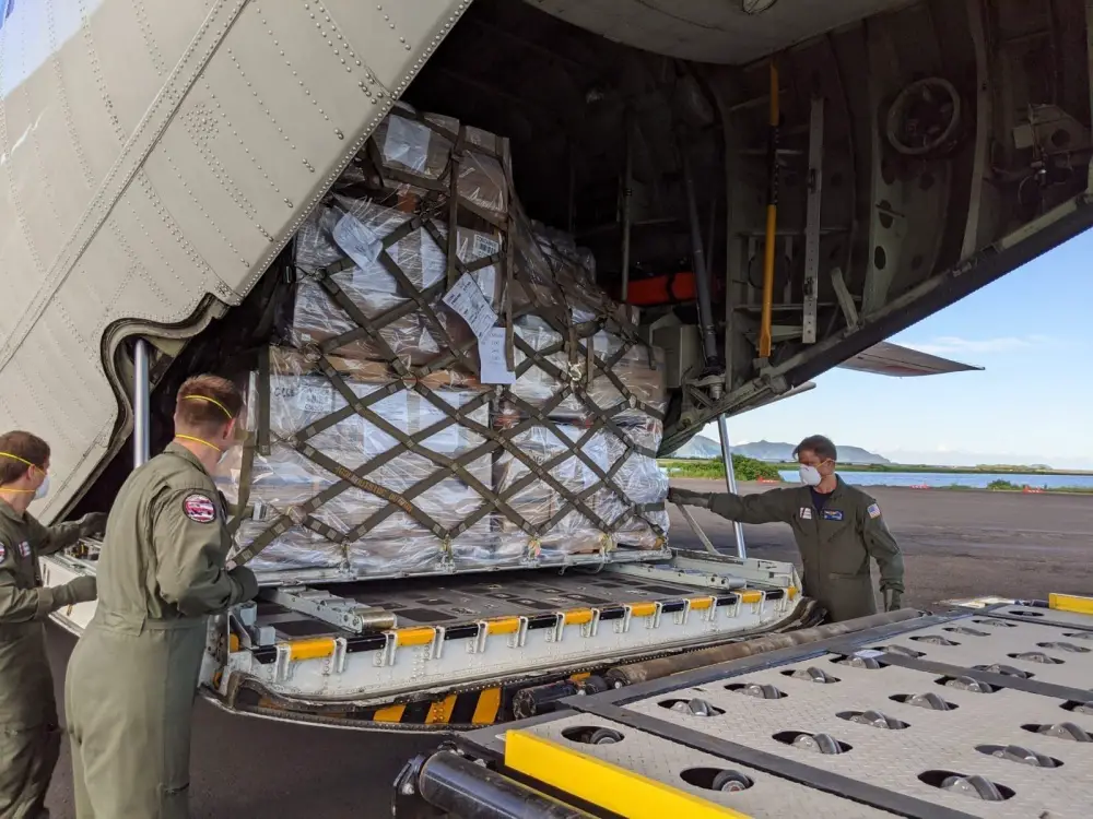 A U.S. Coast Guard HC-130 Hercules airplane crew brought various supplies to American Samoa, April 1, 2020. Working in concert with FEMA and the U.S. Air Force, logistics were coordinated to ensure the timely and successful delivery of supplies including medical supplies from the Strategic National Stockpile. (U.S. Coast Guard photo by Lt. Cmdr. Karl Savacool/Released)