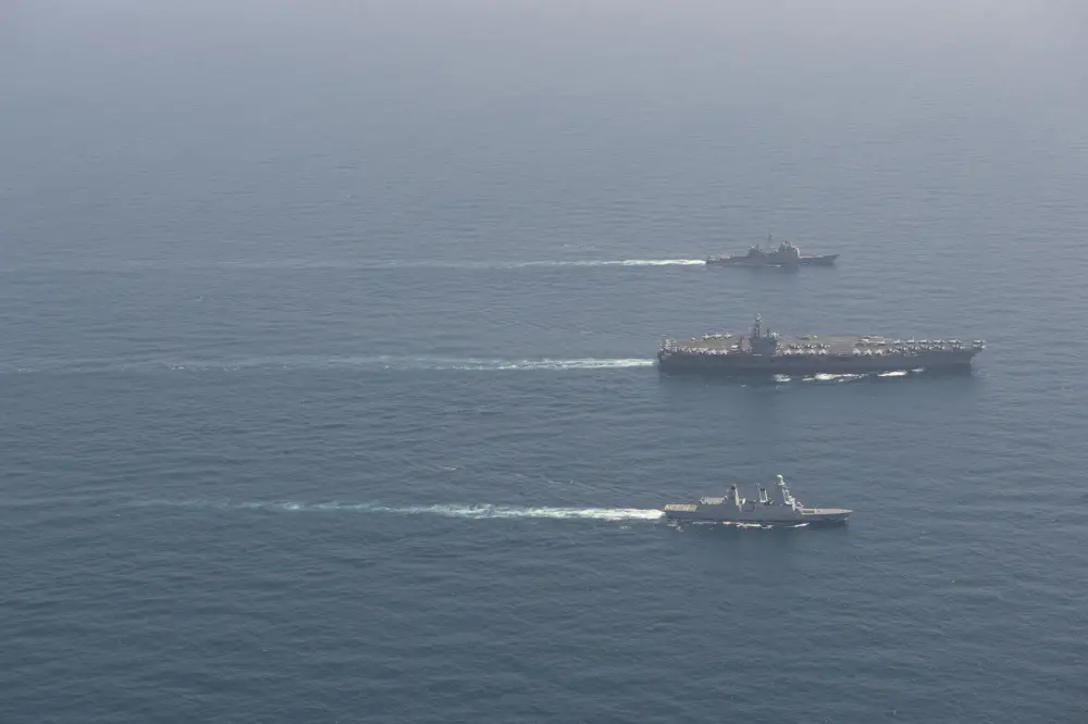The aircraft carrier USS Dwight D. Eisenhower (CVN 69), center, the guided-missile cruiser USS San Jacinto (CG 56), top, and the French anti-air frigate Forbin (D620) conduct a group-sail exercise in the Arabian Sea, April 25, 2020. Ike, San Jacinto and Forbin are operating under national tasking, as they participate in a bilateral, interoperability exercise to strengthen partnership between the U.S. and French navies. (U.S. Navy photo by Mass Communication Specialist Seaman Apprentice Orion K. Shotton)
