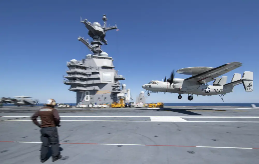 An E2-D Advanced Hawkeye, attached to the "Greyhawks" of Carrier Airborne Early Warning Squadron (VAW) 120, lands on USS Gerald R. Ford's (CVN 78) flight deck during flight operations April 2, 2020. Ford is underway in the Atlantic Ocean conducting carrier qualifications. (U.S. Navy photo by Mass Communication Specialist 3rd Class Brett Walker)