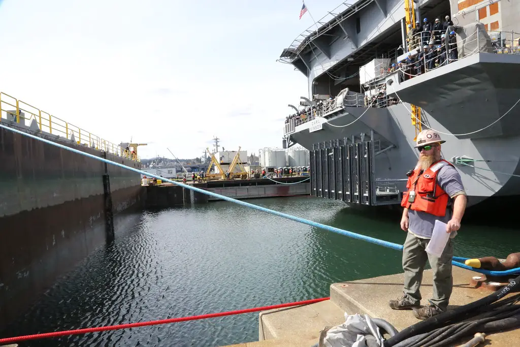 The Nimitz-class aircraft carrier USS Carl Vinson (CVN 70) prepares to depart Dry Dock 6 after spending 14 months undergoing a Docking Planned Incremental Availability period at Puget Sound Naval Shipyard & Intermediate Maintenance Facility.