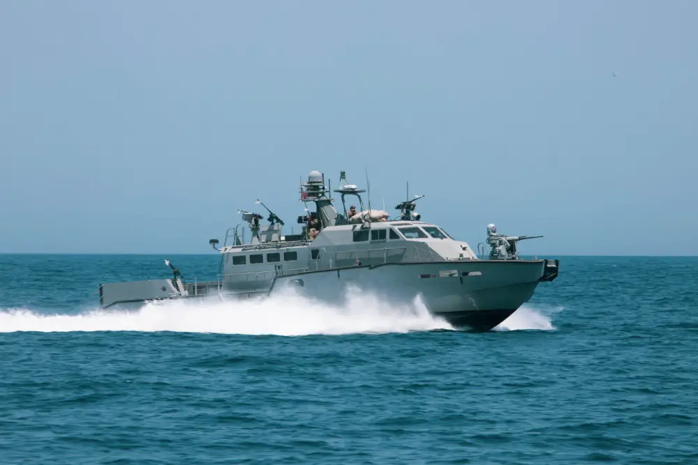 A Mark VI patrol boat participates in the bilateral Mine Countermeasures Exercise 2020 (MCMEX 20) with the mine countermeasures ship USS Gladiator (MCM 11) in the Arabian Gulf, March 28. Gladiator is forward-deployed to the U.S. 5th Fleet area of operations in support of naval operations to ensure maritime stability and security in the Central region, connecting the Mediterranean and the Pacific through the Western Indian Ocean and three strategic choke points. (U.S. Army photo by Pfc. Christopher Cameron)