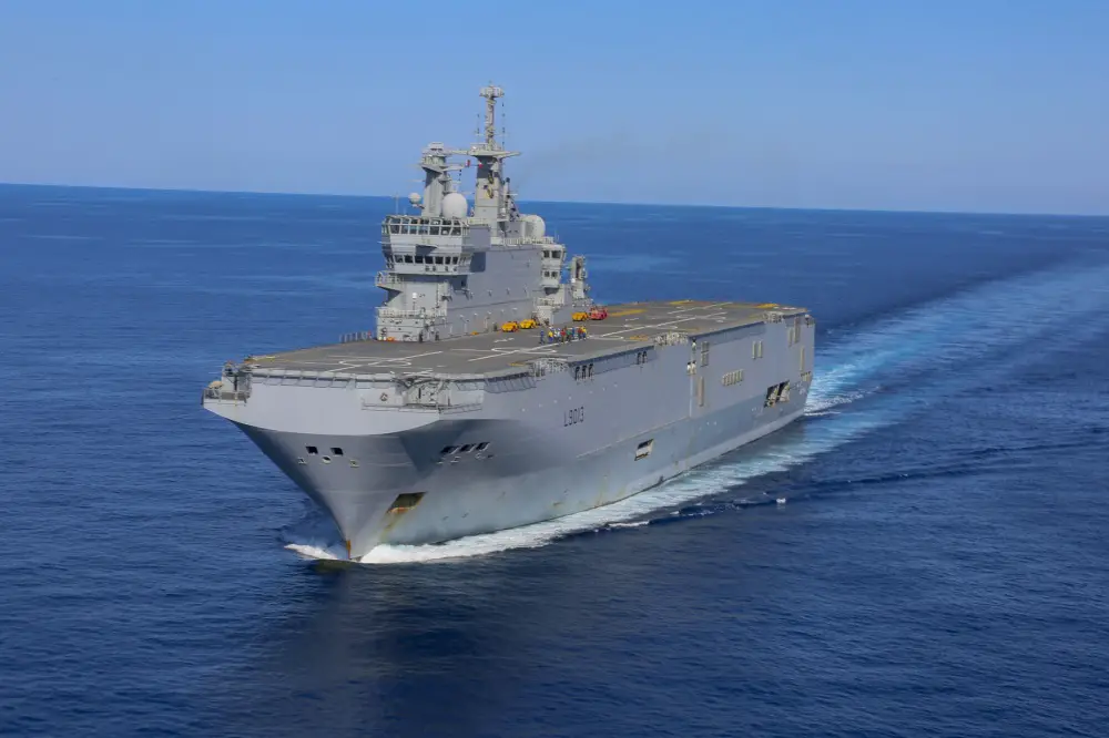 The French Navy amphibious assault ship Mistral sails in the vicinity of the amphibious assault ship USS Bataan (LHD 5) June 24, 2020. The Bataan is conducting operations in U.S. 6th Fleet in support of regional allies and partners, and U.S. national security interest in Europe and Africa. (U.S. Marine Corps photo by Cpl. Gary Jayne III/Released)