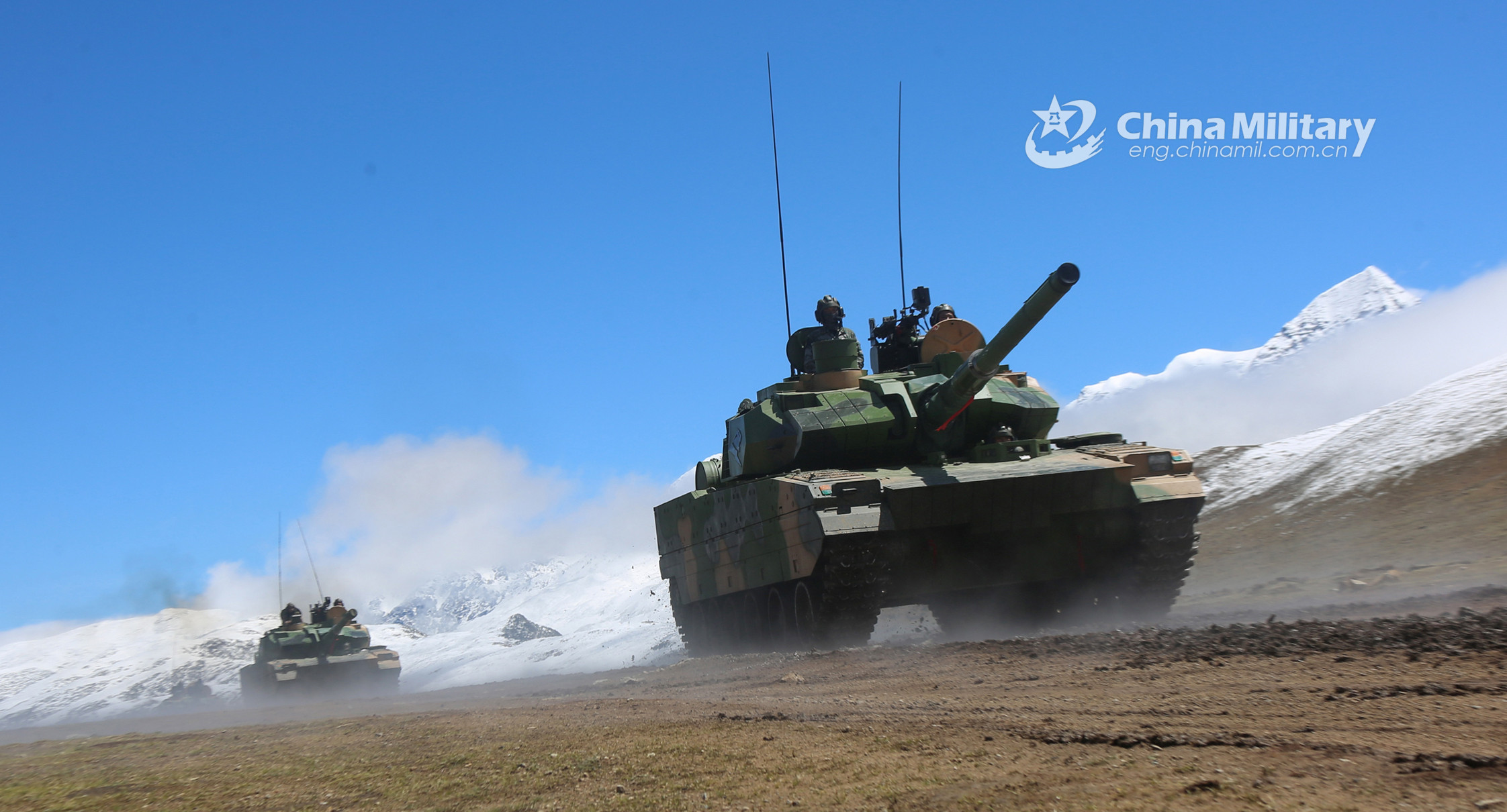 Type 15 Light Tanks attached to a combined arms brigade under the PLA Xizang Military Command maneuver in formation to a designated firing point during a live-fire training exercise in southwest China's Xizang Autonomous Region from June 8 to 11, 2020. (eng.chinamil.com.cn/Photo by Li Song)