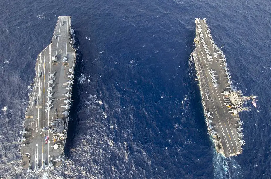 The USS Harry S. Truman CVN 75 Nimitz-Class aircraft carrier operates for the first time at sea with USS Gerald R. Ford (CVN-78) Ford-Class aircraft carrier.
