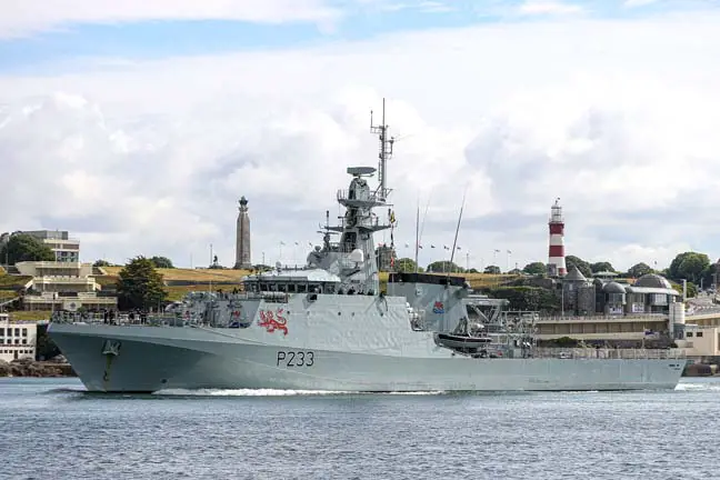 Royal Navy HMS Tamar raises her flag on her own river