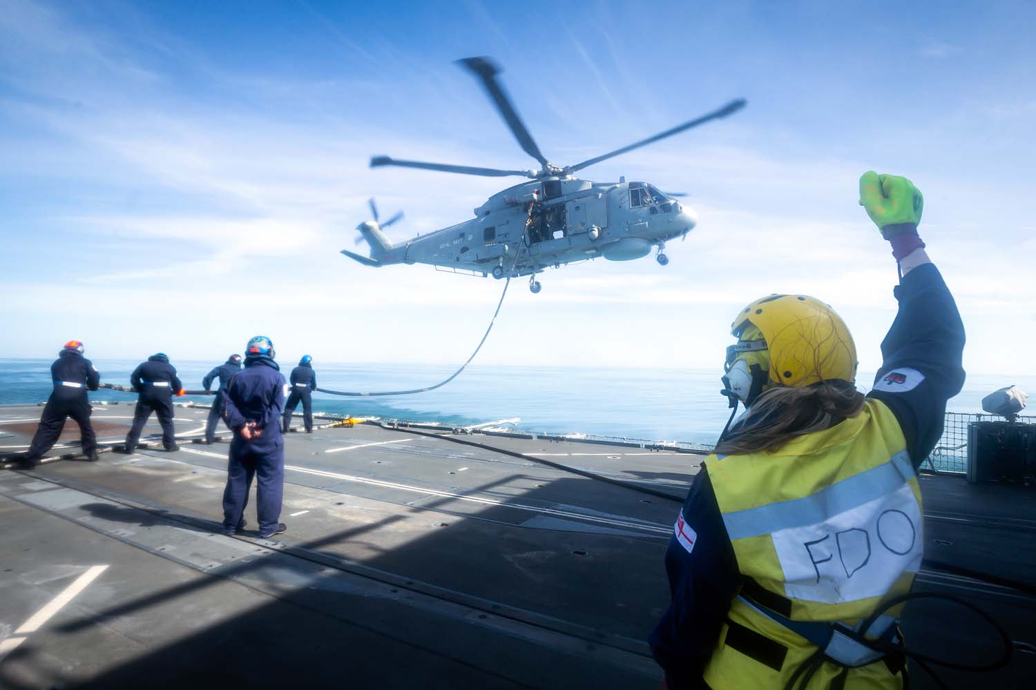 Royal Navy Merlin Helicopter Refuels in Flight from HMS Westminster