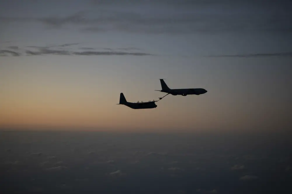 A U.S. Air Force KC-135 Stratotanker refuels a MC-130J Commando II Nov. 4th, 2019, over the Pacific Ocean. 