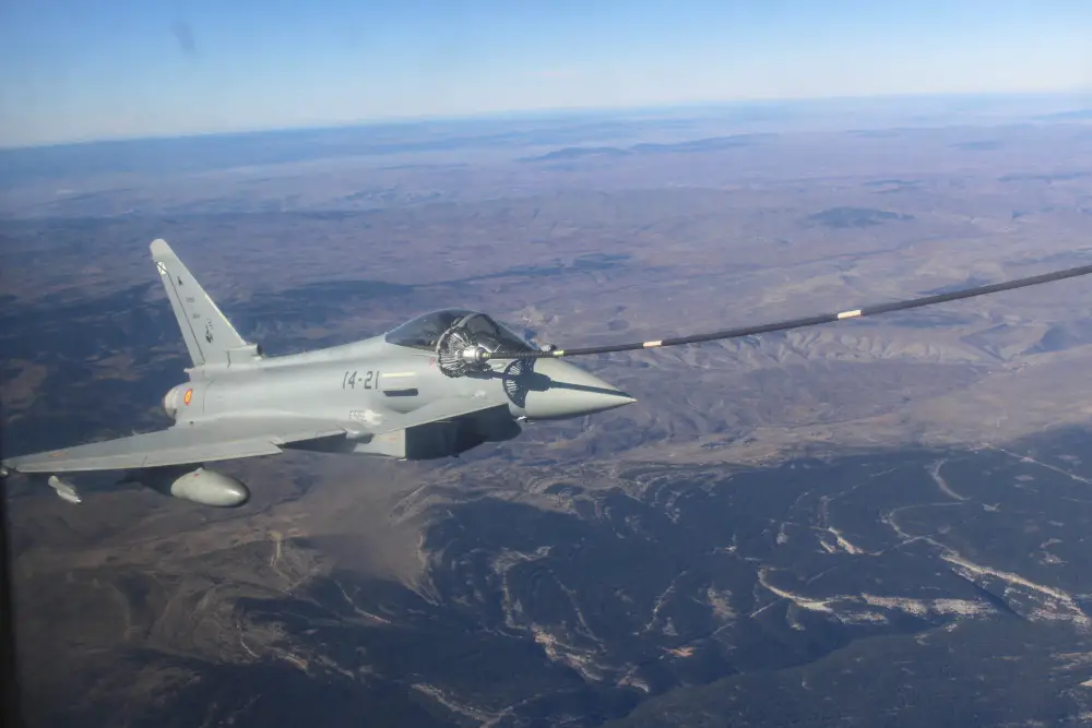 A Spanish Air Force Eurofighter Typhoon with the 11th Wing receives fuel from a U.S. Marine Corps KC-130J.