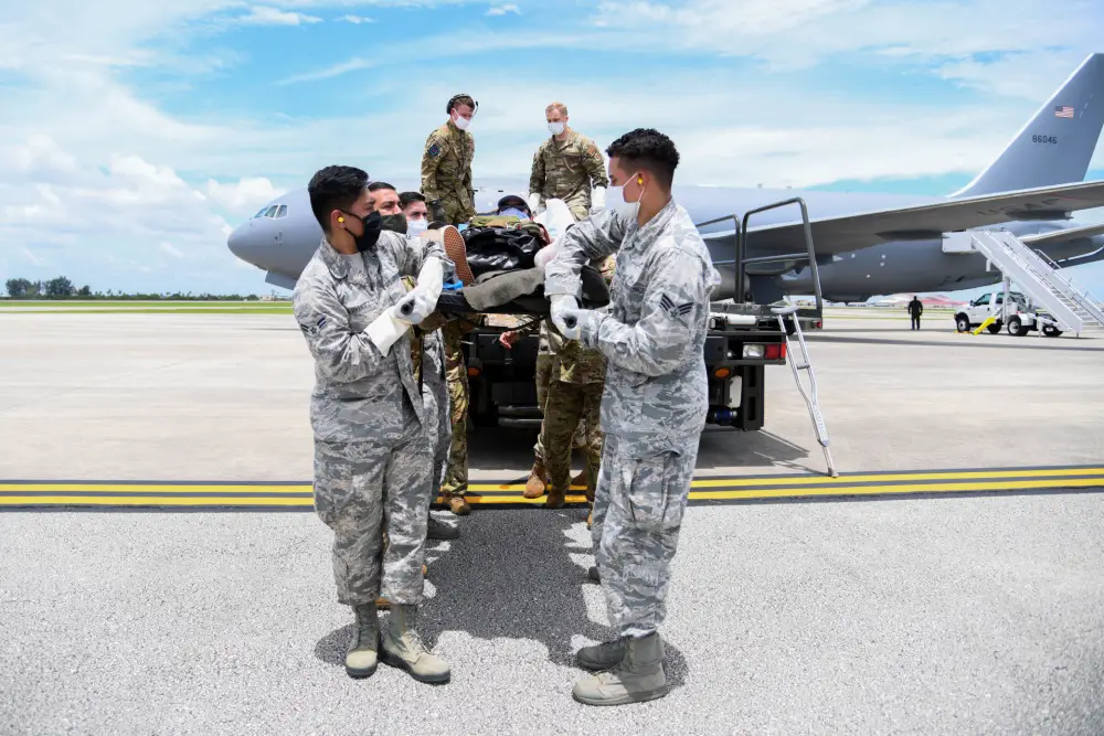 Airmen from the 45th Operational Medical Readiness Squadron, offload a patient July 10, 2020, at Patrick Air Force Base, Florida. The patients had recently returned from overseas to their home stations for follow-on care.