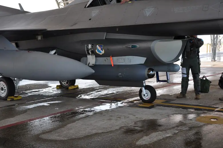 An F-16 Fighting Falcon, piloted by Lt. Col. Jeremy "Clutch" Castor, from the 85th Test and Evaluation Squadron takes flight on its first ever flight with the Legion Pod.