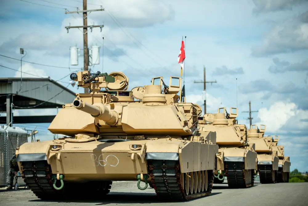 Troopers assigned to Bravo Company, 3rd Battalion, 8th Cavalry Regiment, 3rd Armored Brigade Combat Team (3ABCT), 1st Cavalry Division, stage the first set of new M1A2C (SEP v.3) Abrams Tanks at Fort Hood, Texas, July 21, 2020. 